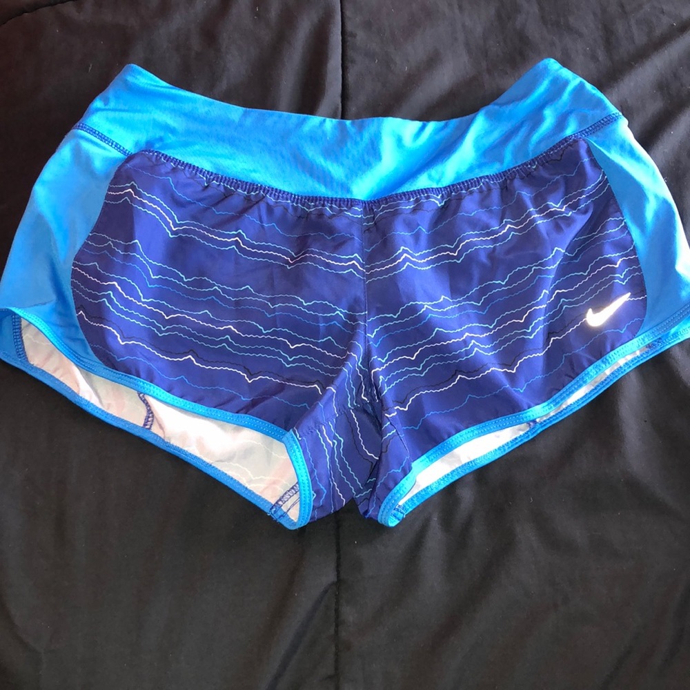 Blue nike running shorts